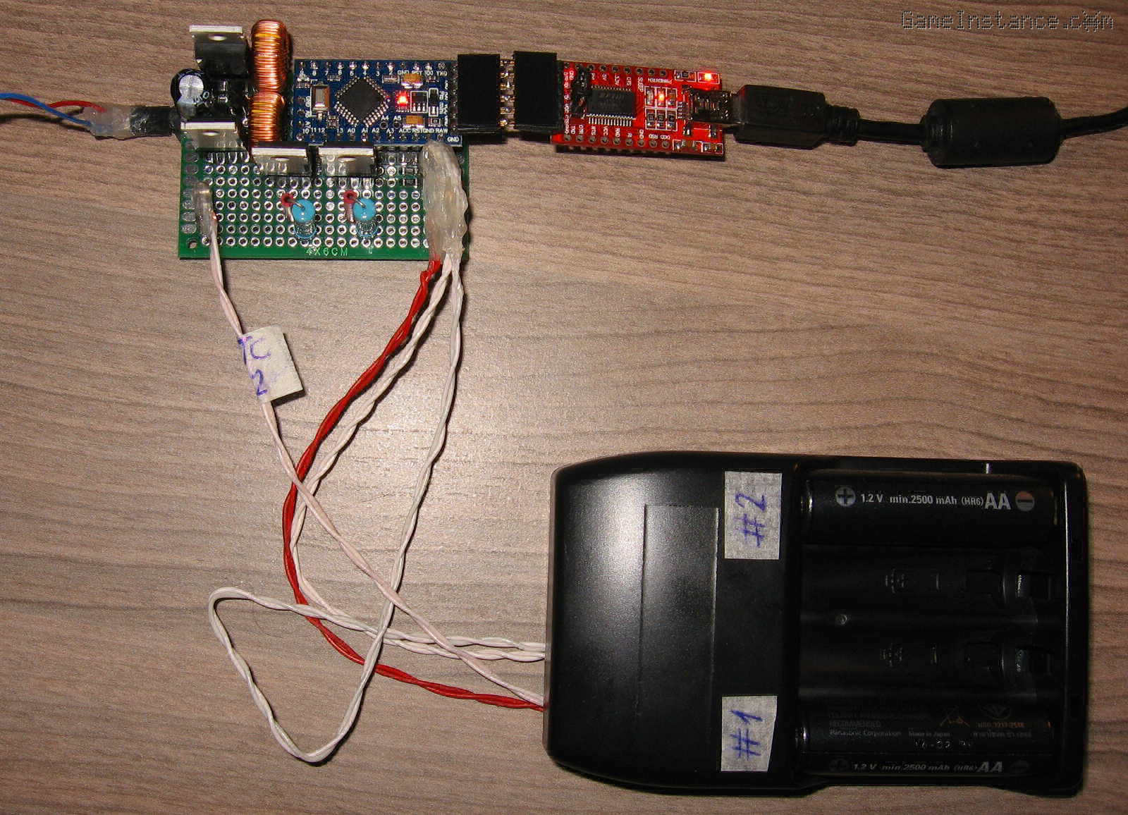 NiMH Smart Dual Battery Charger at work. FTDI used for serial statistics gathering.