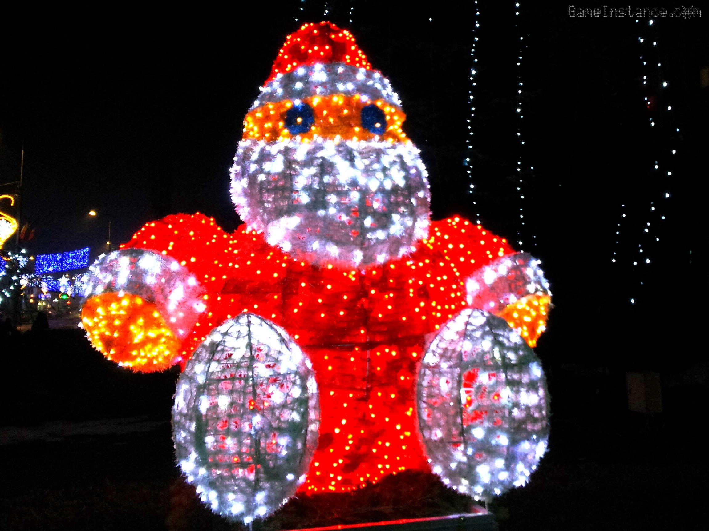 An illuminated large Santa Claus shaped structure